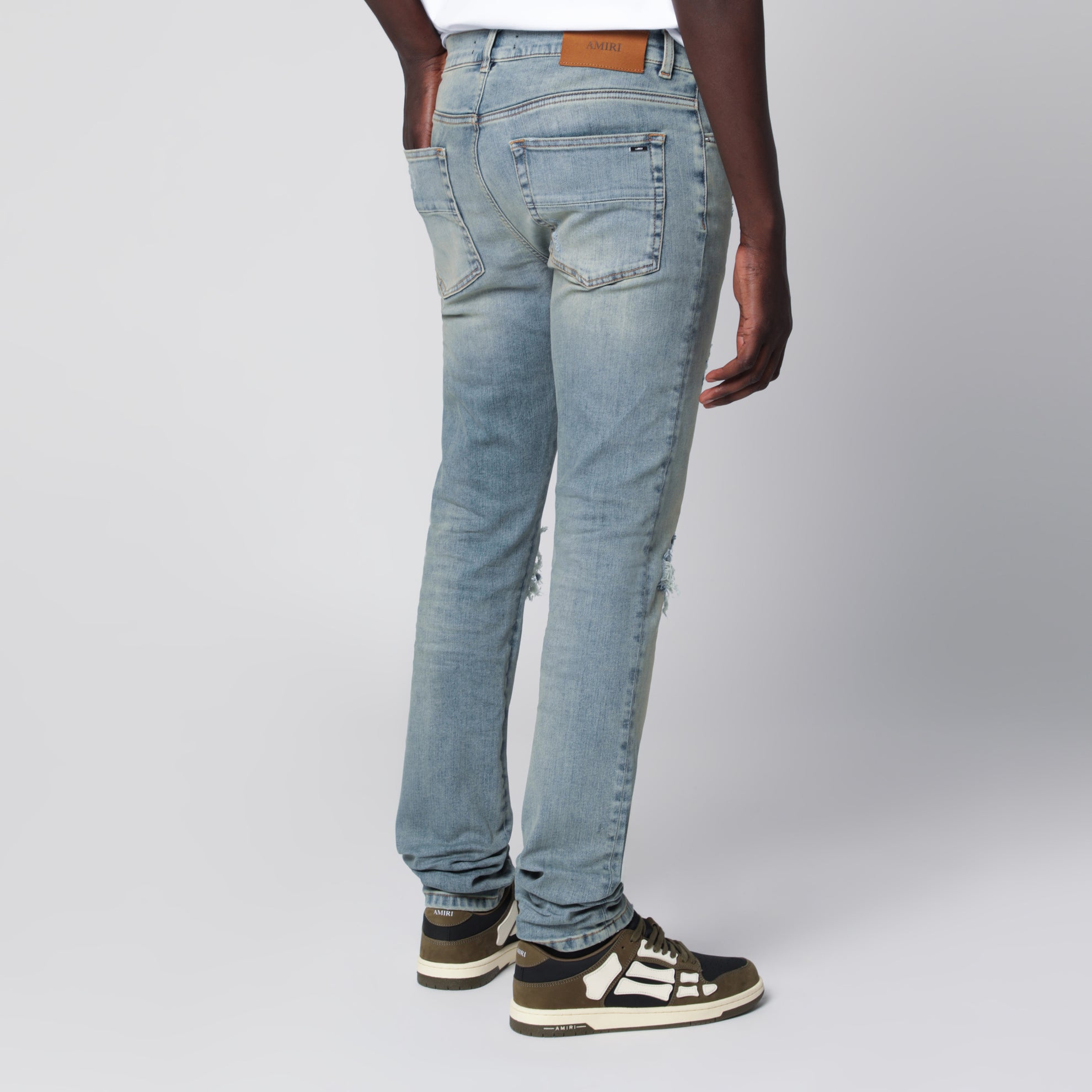 MX1 distressed flannel-patched jeans in medium indigo