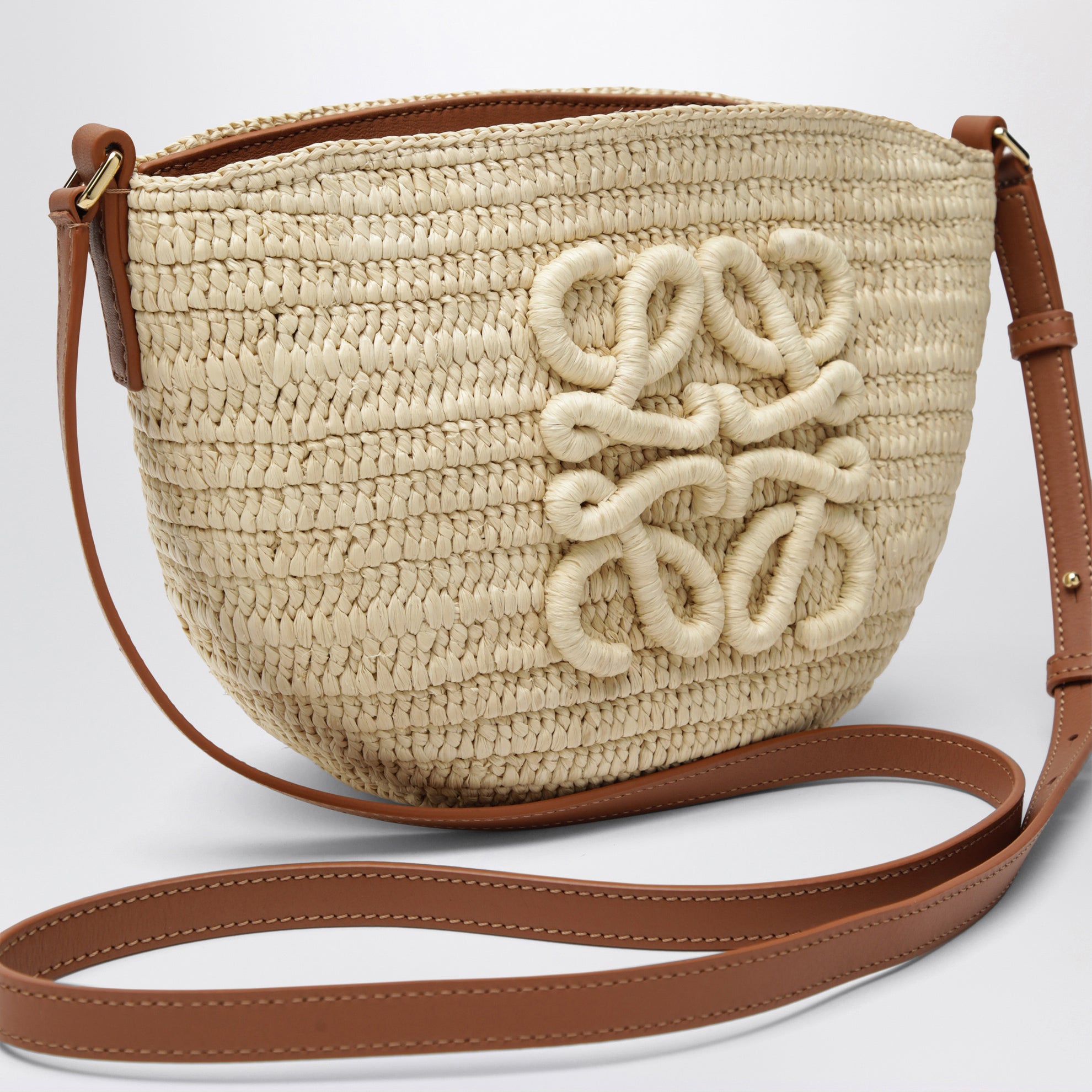 Eclipse pouch in raffia and leather