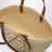 Eclipse medium basket bag in raffia and leather