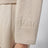 Beige cropped sweatshirt in silk blend