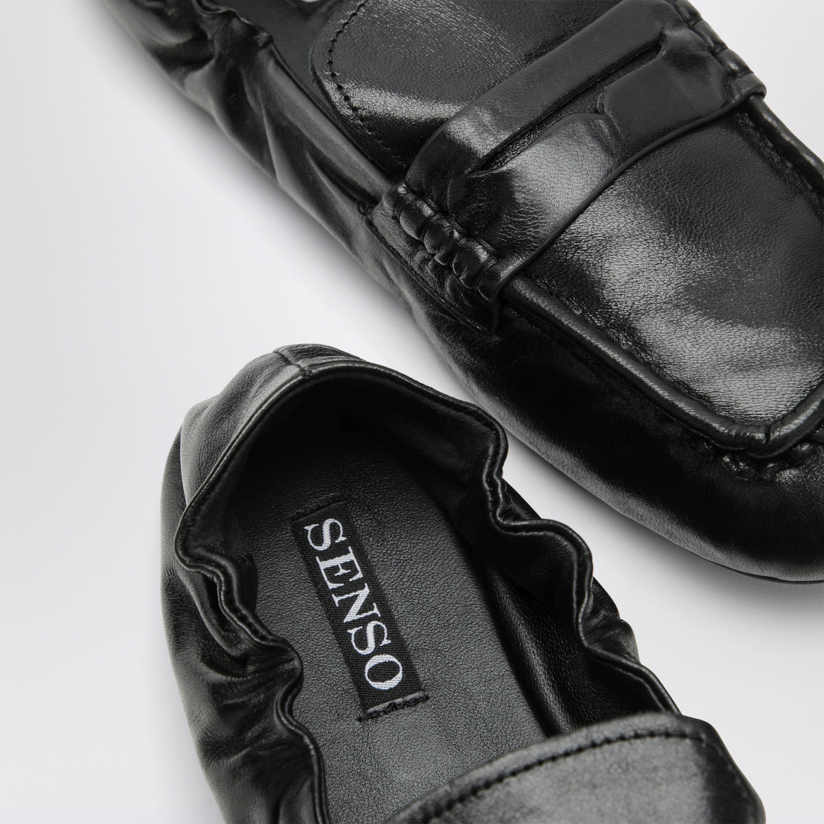 Ebenholzfarbene Astro Loafer aus Leder