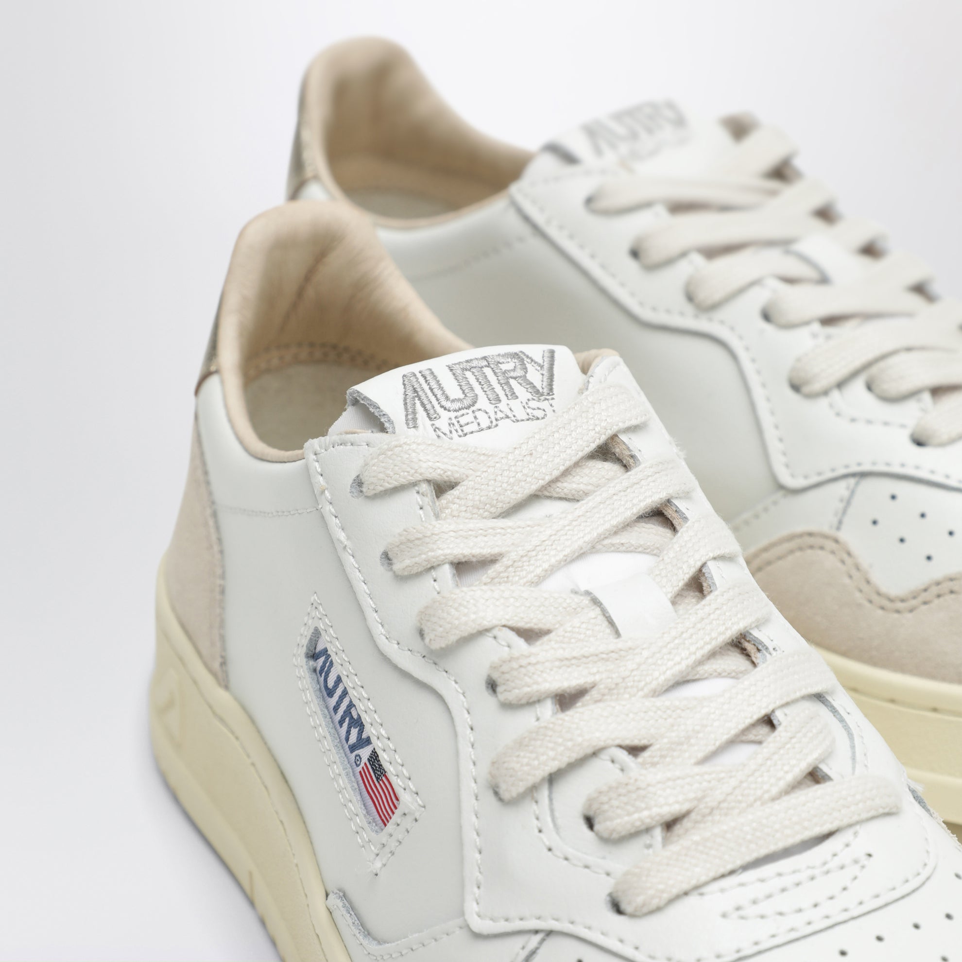 Medalist Low sneakers in white leather and gold suede