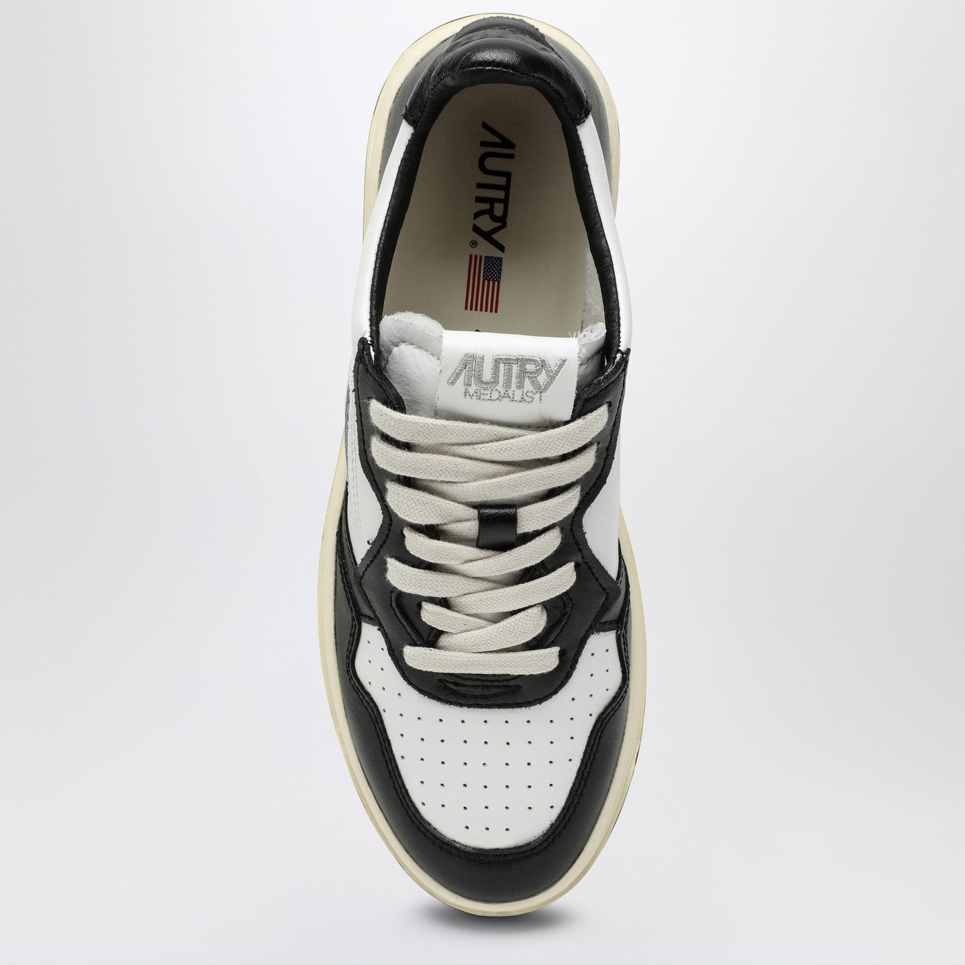 Medalist black/white leather trainer