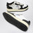 Medalist black/white leather trainer