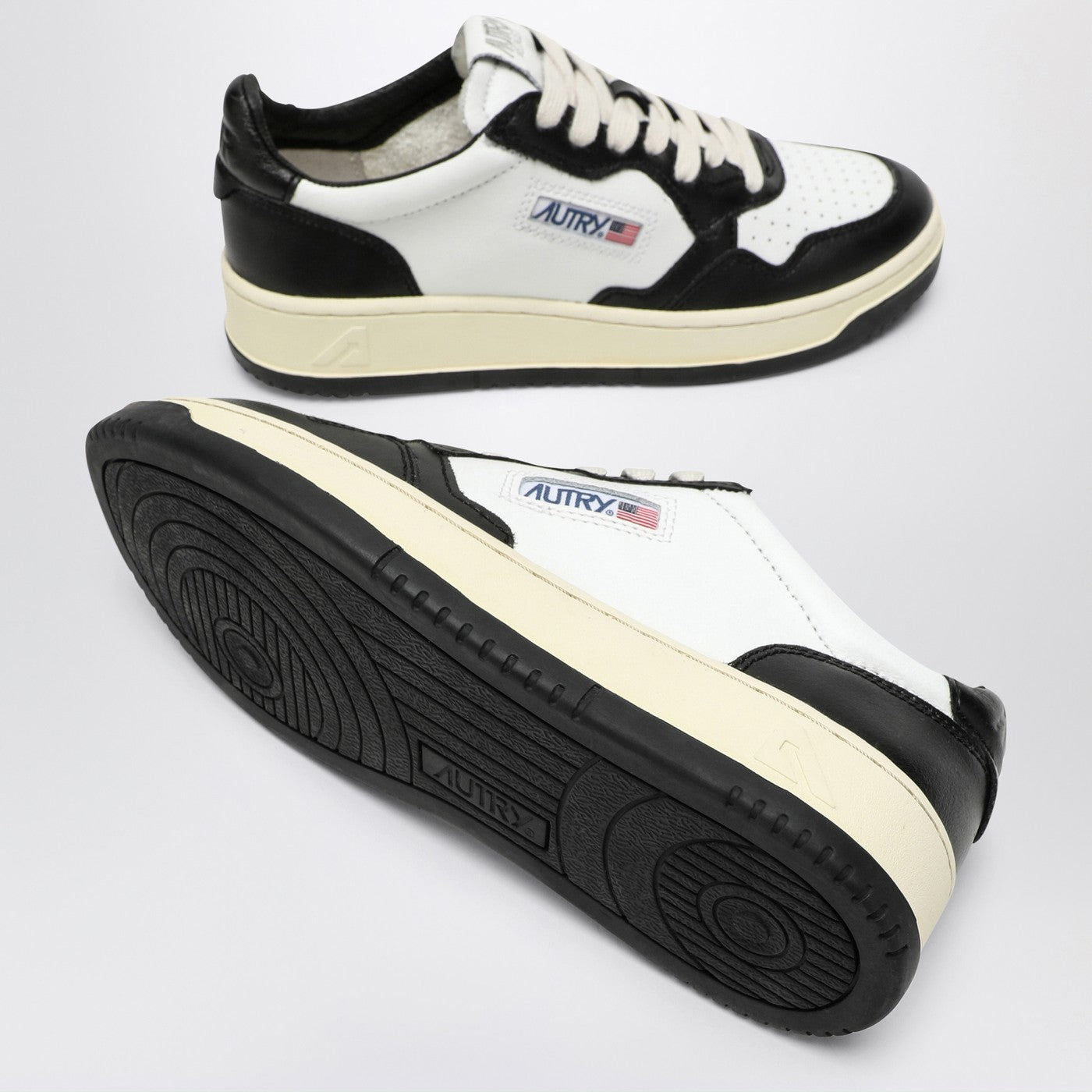 Medalist black/white leather trainer