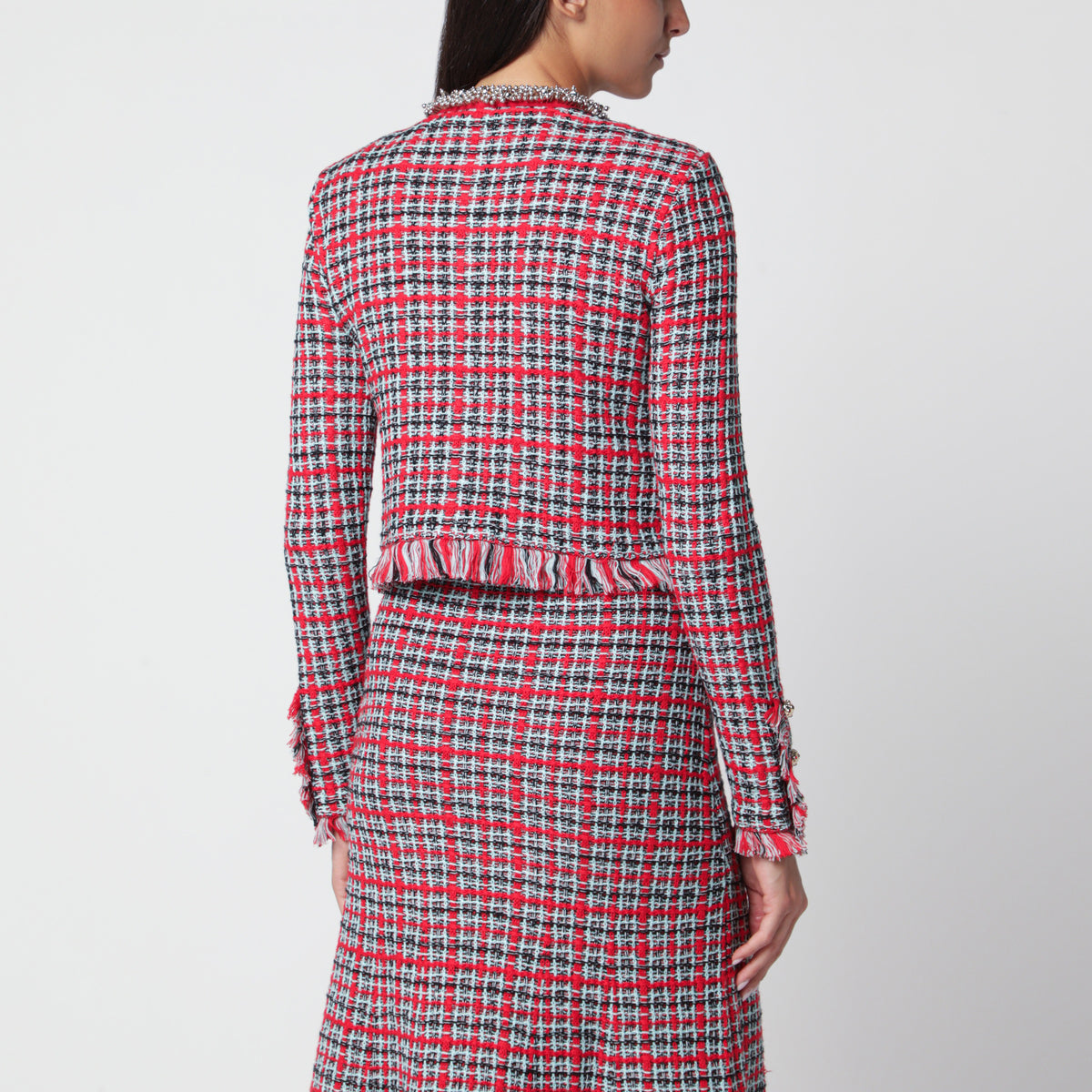 Rote, karierte Strickjacke mit Fransen