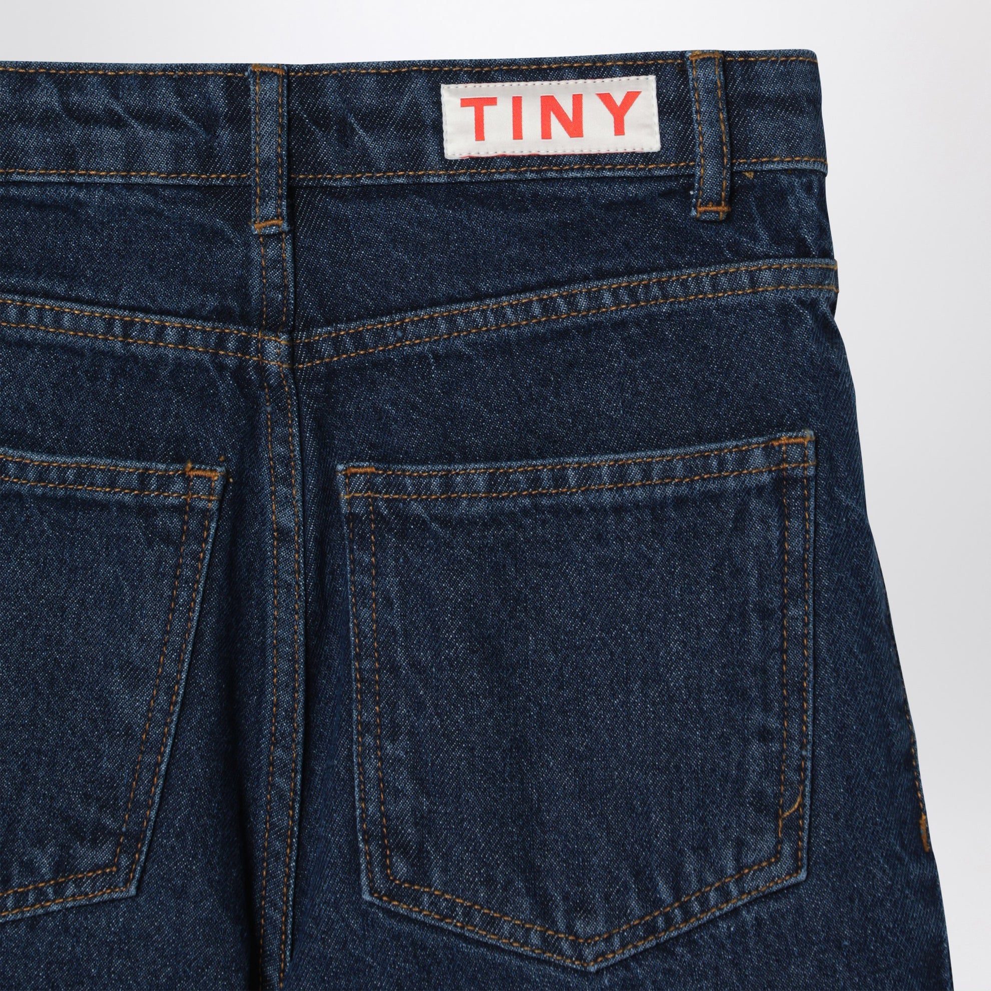 Jeans blu scuro con funghi ricamati