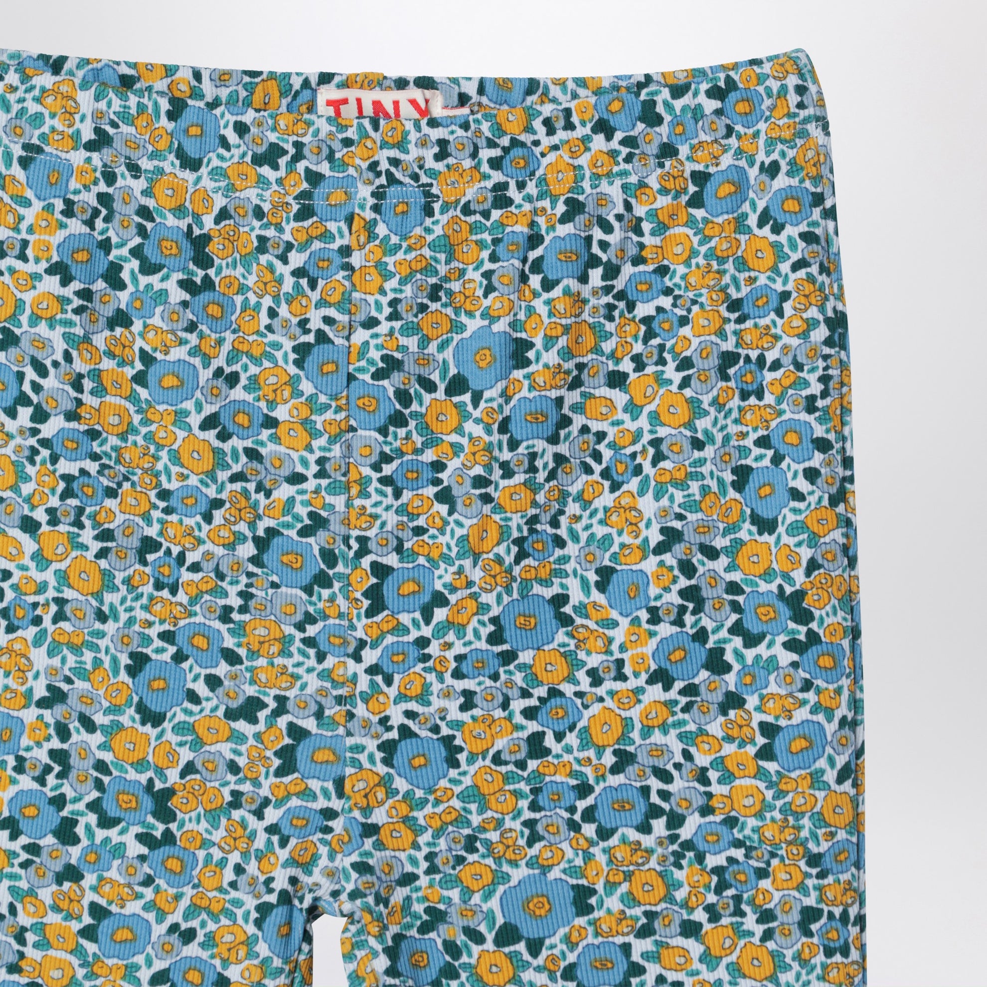 Pantaloni azzurri con stampa floreale in cotone