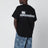 T-shirt nera in cotone con logo