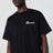 T-shirt nera in cotone con logo