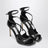 Azia Sandalen aus schwarzem Lackleder