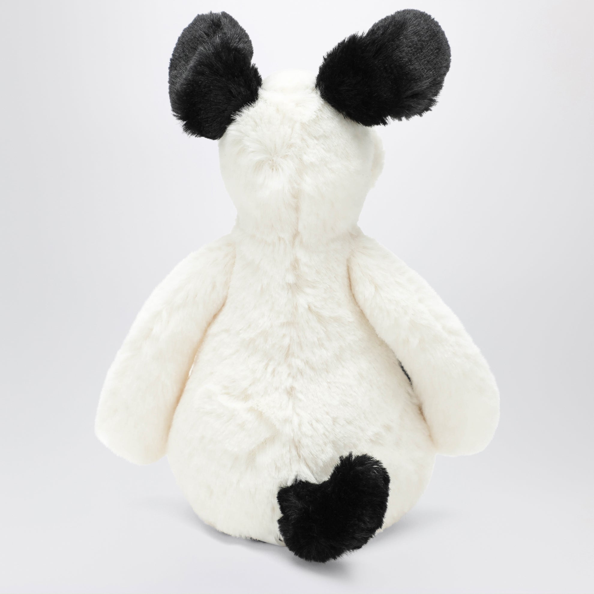 Peluche a forma di cagnolino bianco/nero