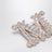 Spilla Monogram con microcristalli in metallo