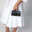Bambino small leather shoulder bag in black