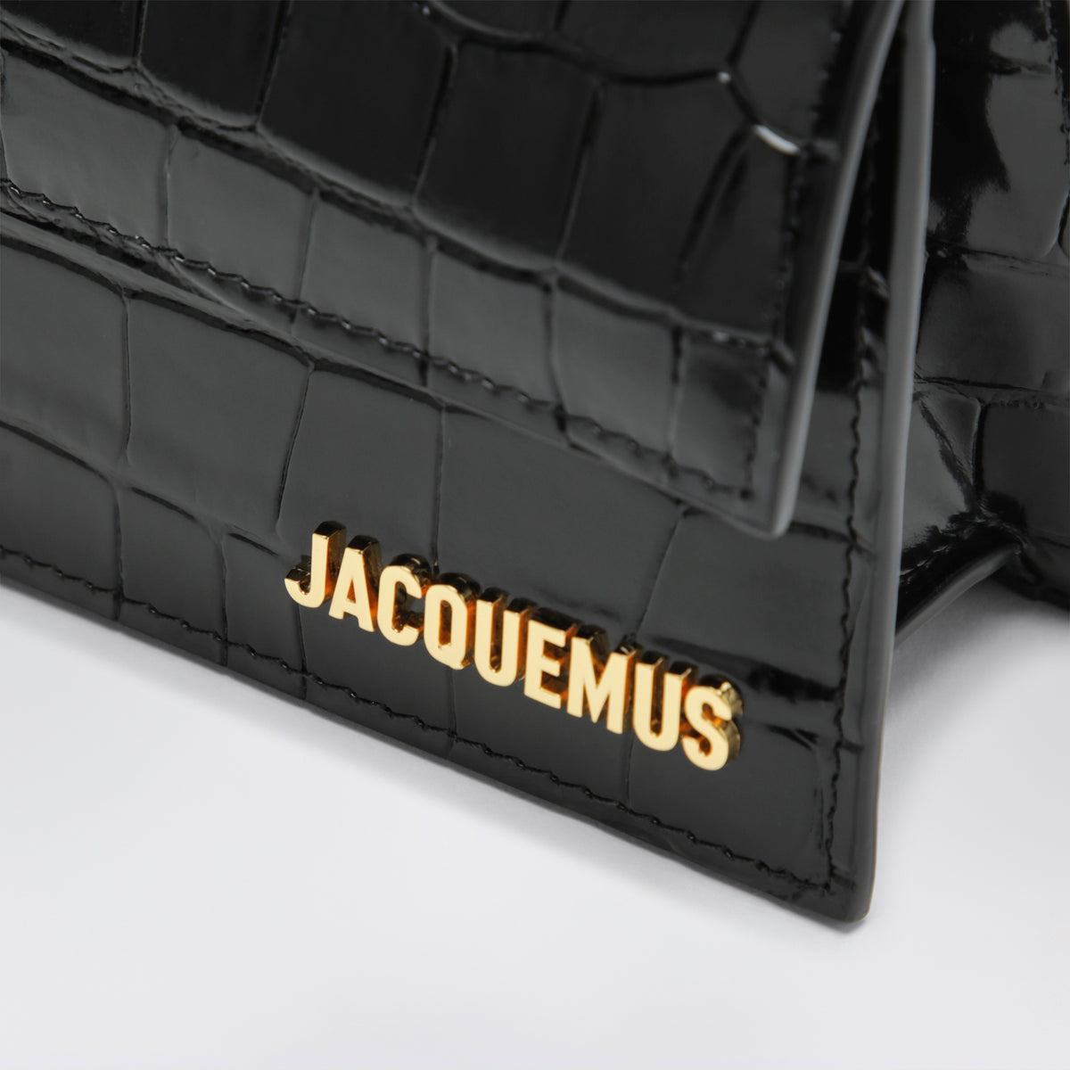 Pochette Le Bambino nera in pelle effetto coccodrillo