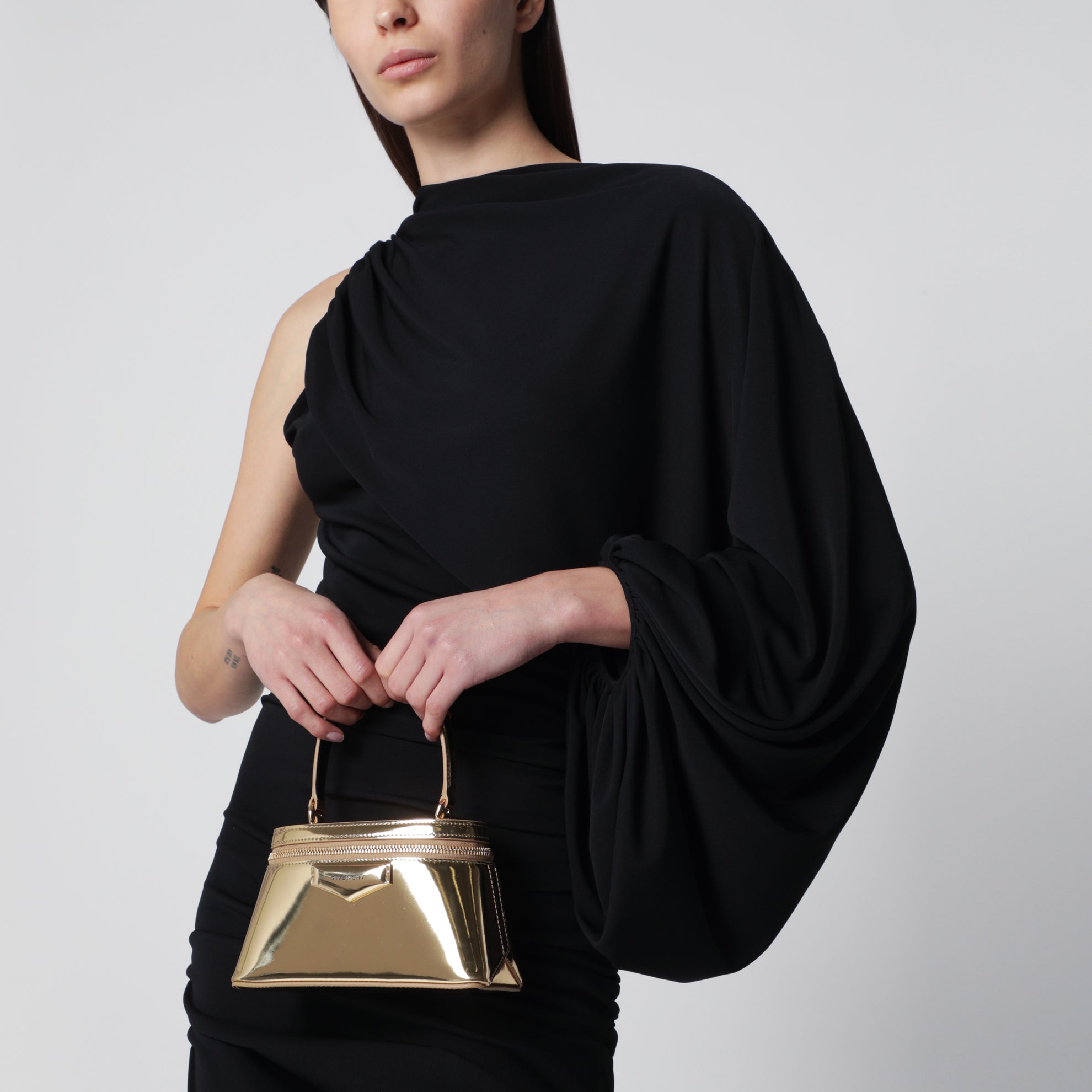 Trousse Antigona dorée en cuir effet miroir