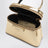 Trousse Antigona dorée en cuir effet miroir
