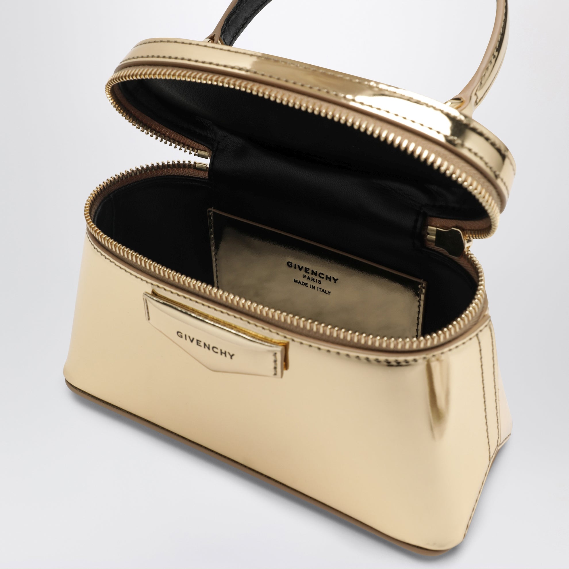 Trousse Antigona dorée en cuir effet miroir