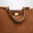 Medium Vittoria suede bag in camel