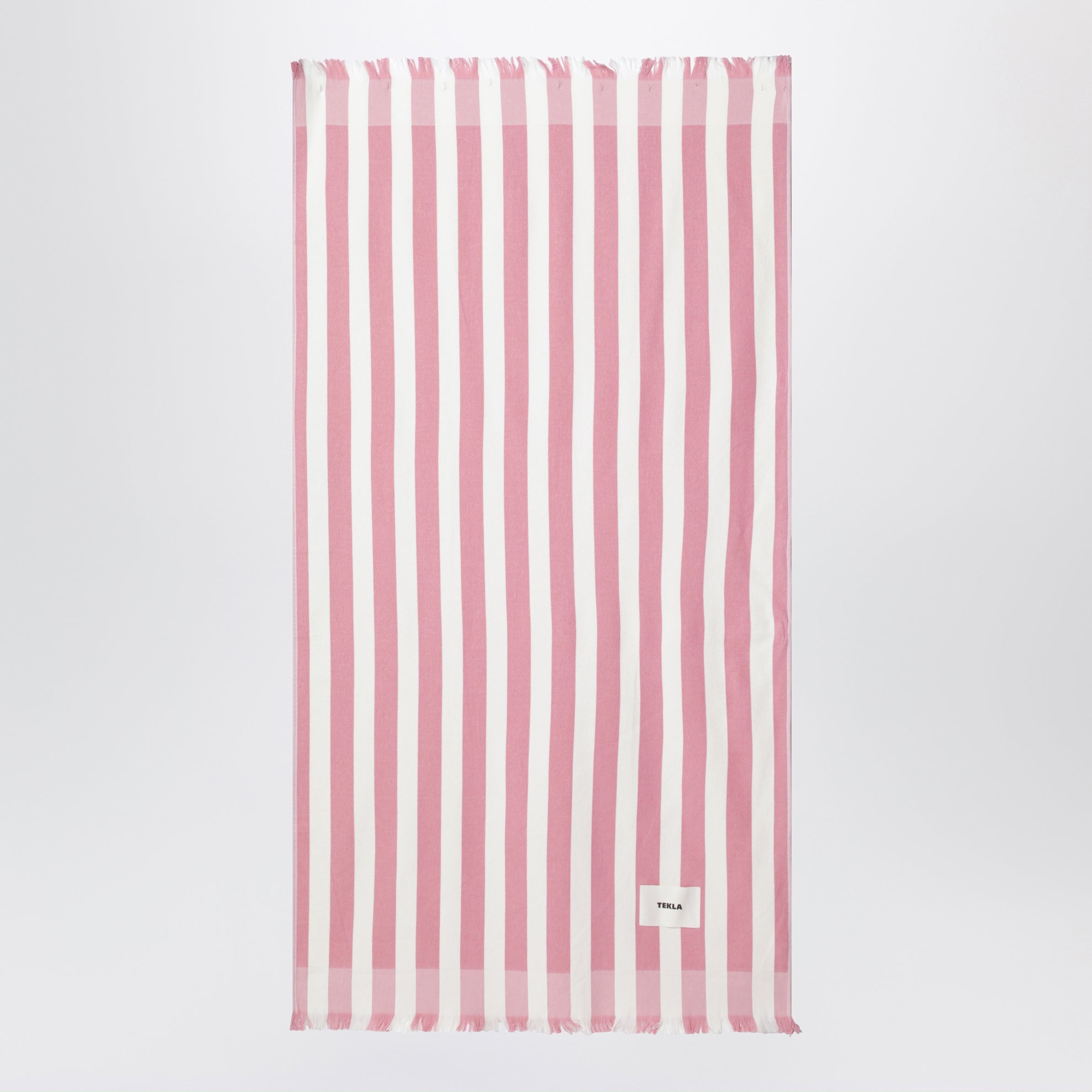 Pink/white striped beach towel