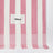 Pink/white striped beach towel