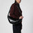 Croissant bag media nera in cotone rivestito