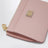Portacarte con zip in pelle di vitello rosa carne