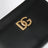 Porte-cartes zippé noir en cuir avec logo DG