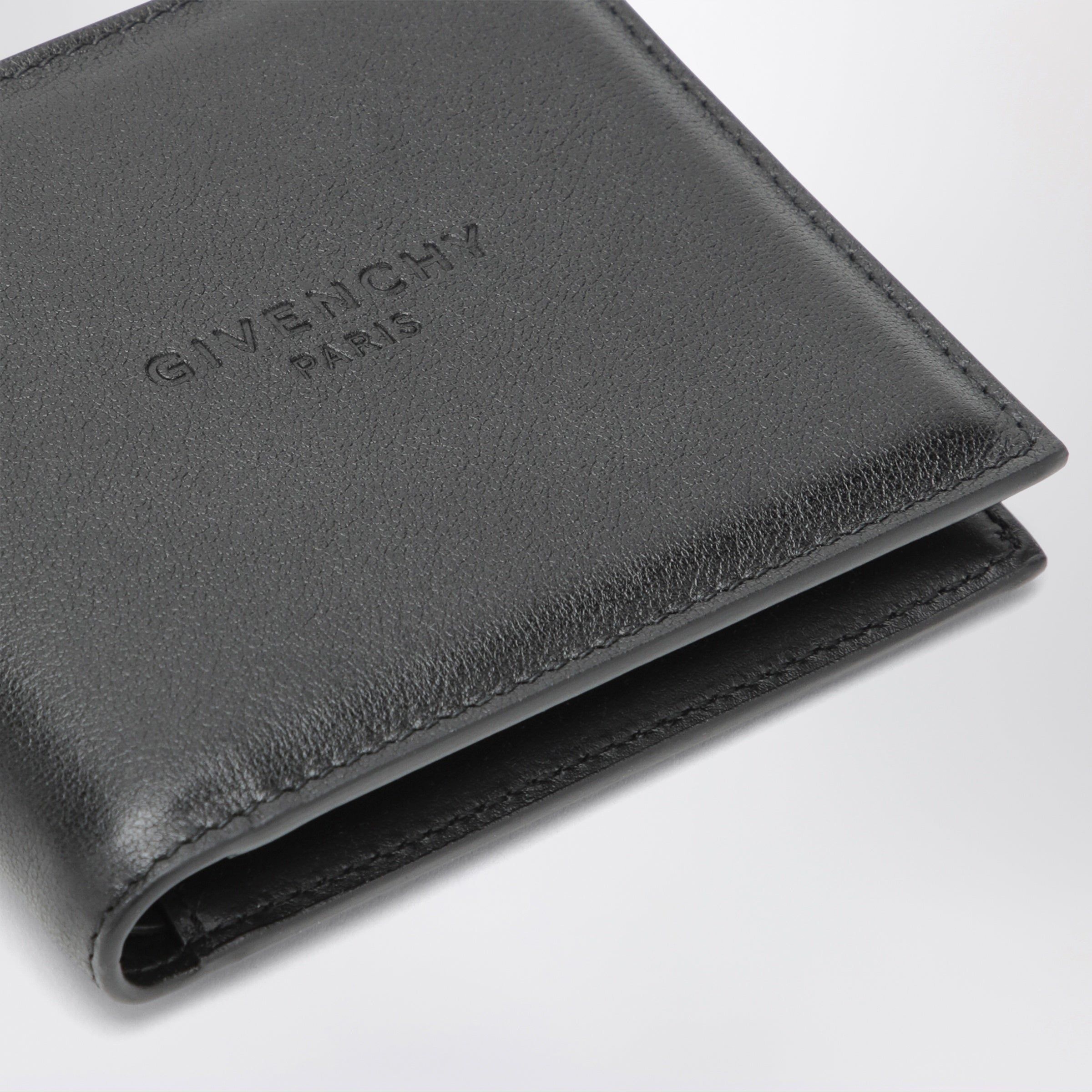 Givenchy Embossed-logo calf leather wallet in black | TheDoubleF