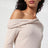 Beige sweater with bare shoulder