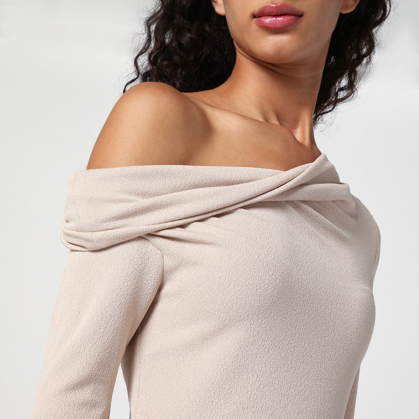 Beige sweater with bare shoulder