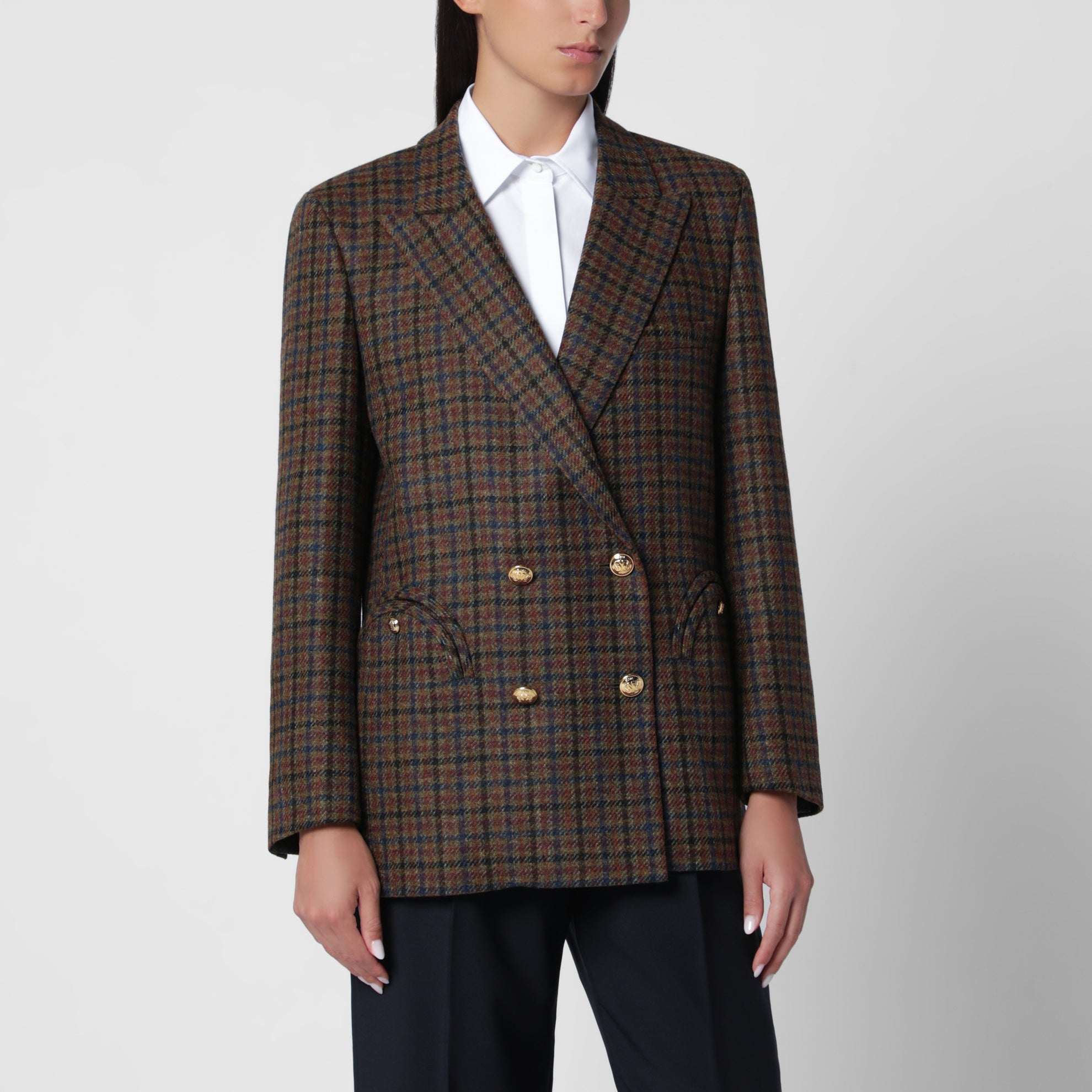 Double-breasted dark green jacket with check pattern in wool