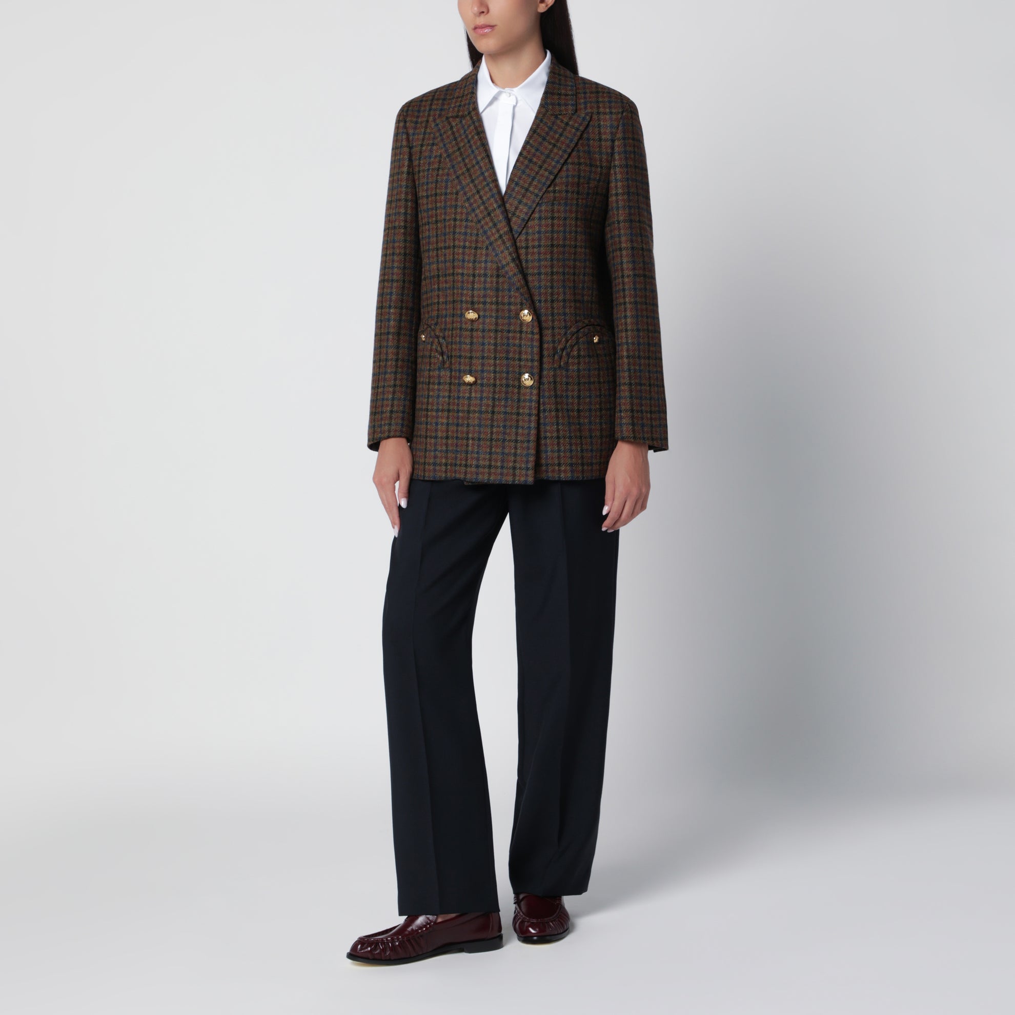 Double-breasted dark green jacket with check pattern in wool