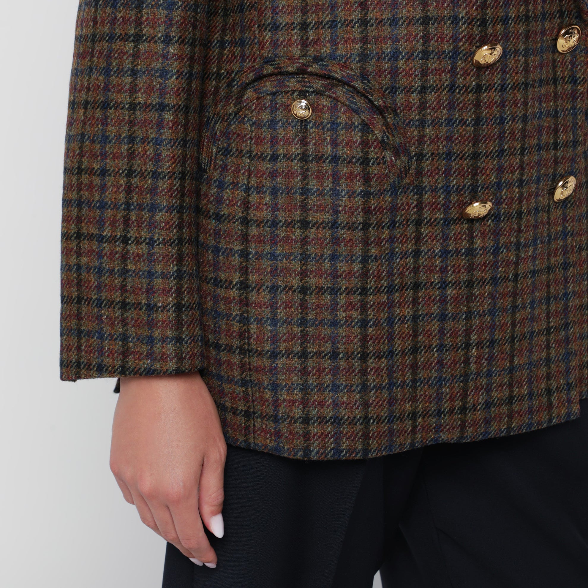 Double-breasted dark green jacket with check pattern in wool