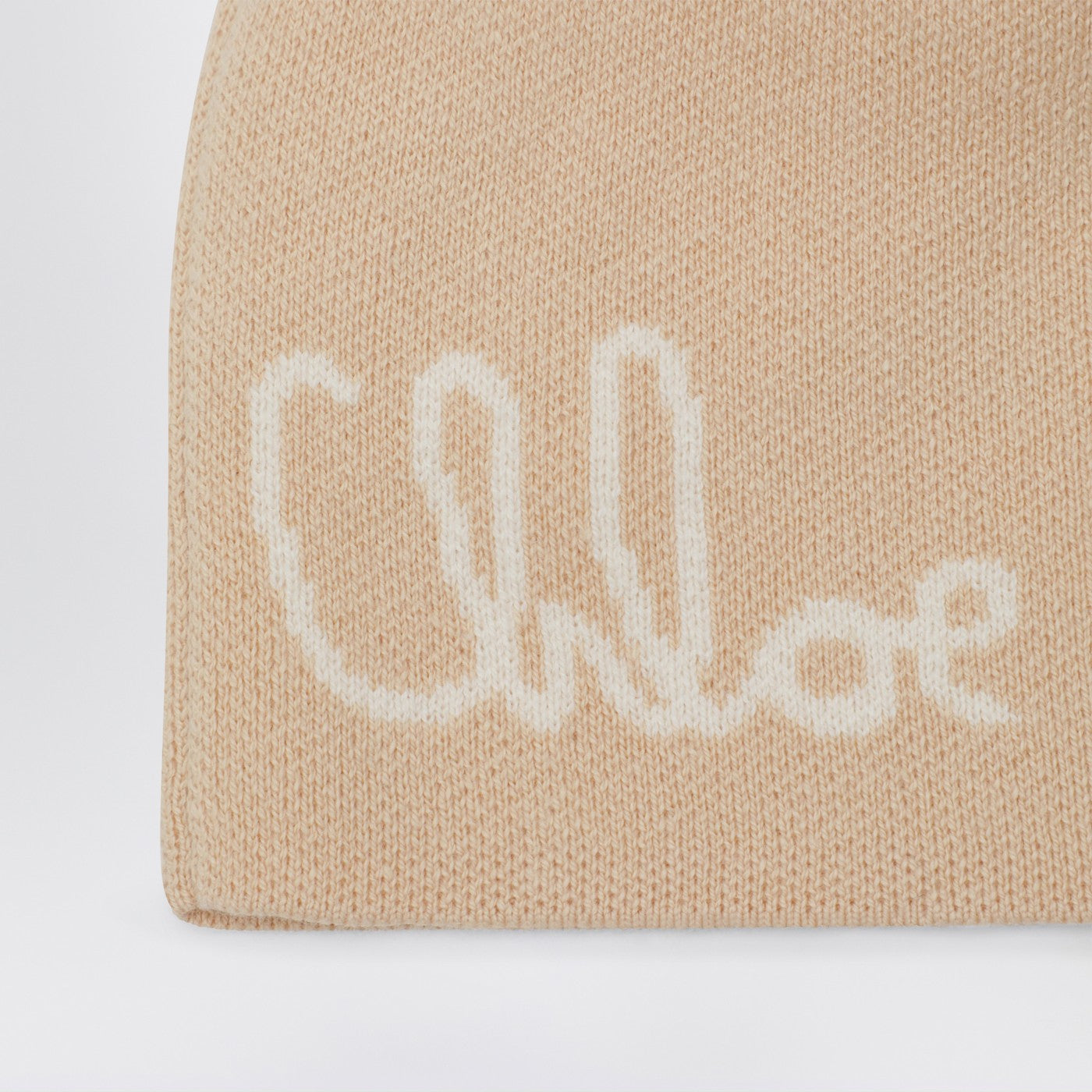 Berretto con pompon beige con logo