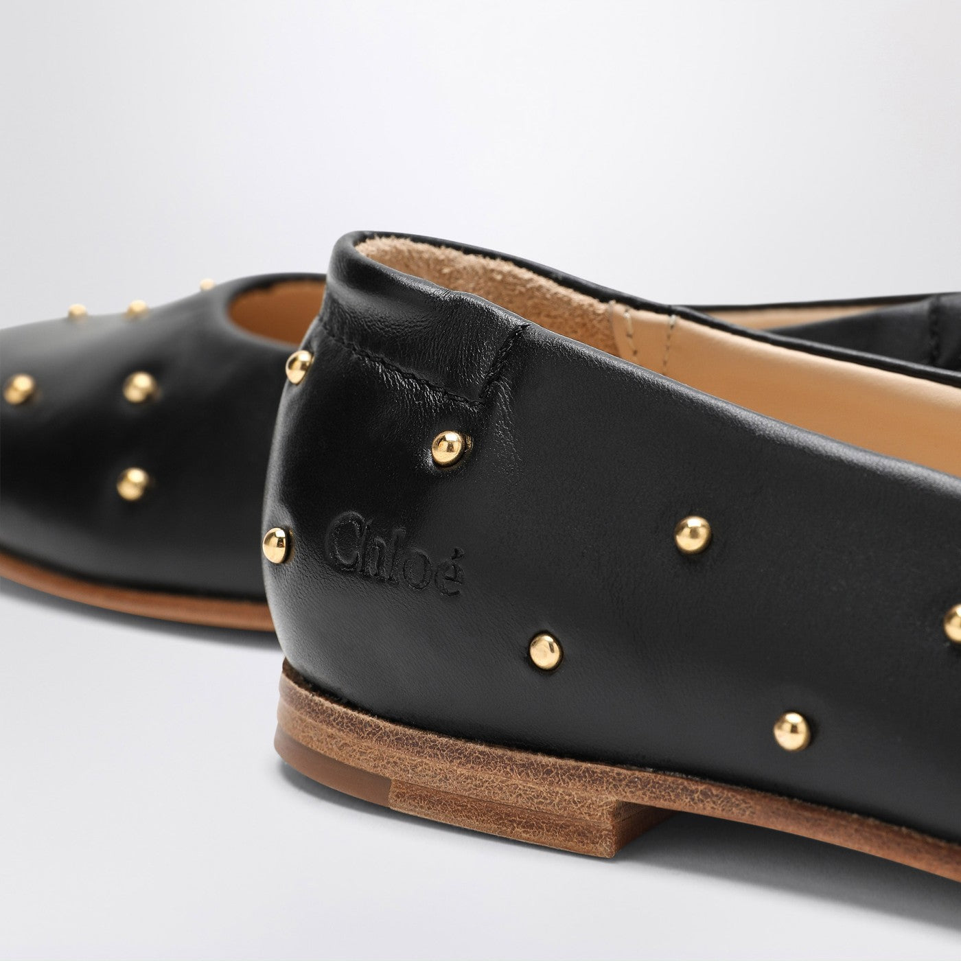 Black ballet flats with small studs