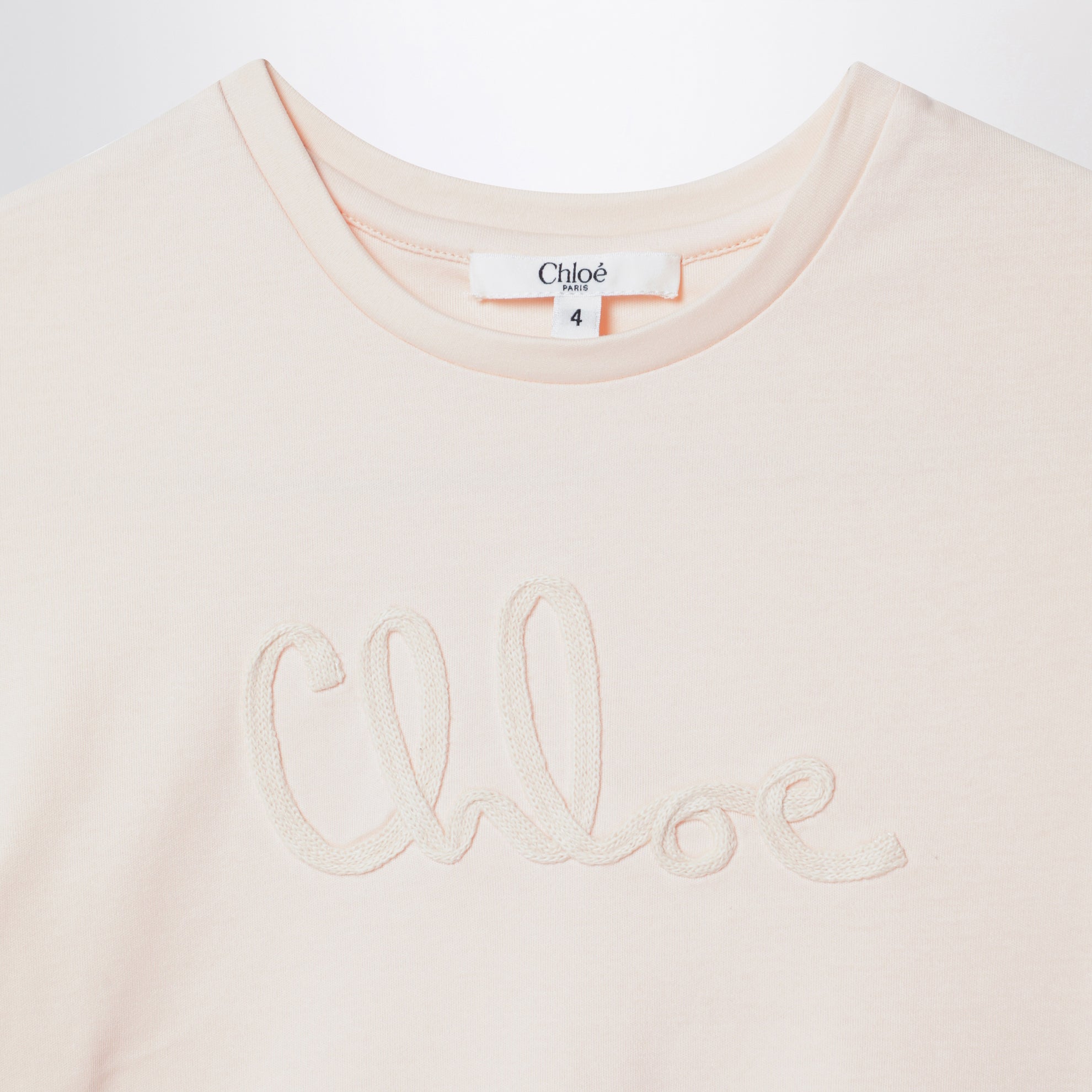 T-shirt cropped rosa chiara con ricamo logo
