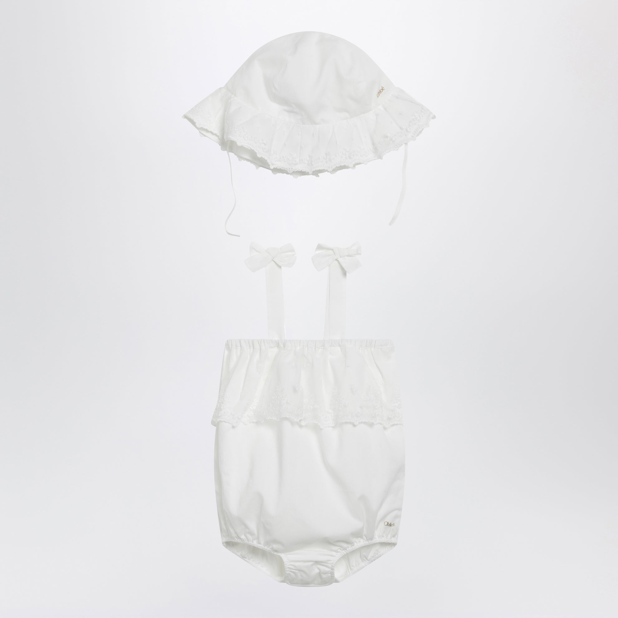 White cotton romper with matching hat