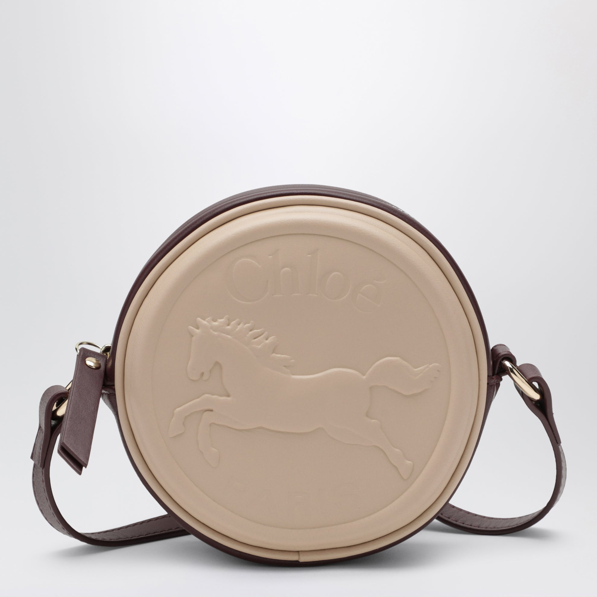Sac à bandoulière circulaire rose clair en cuir