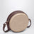 Sac à bandoulière circulaire rose clair en cuir