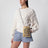 Pearl grey/mustard raffia and leather drawstring pouch