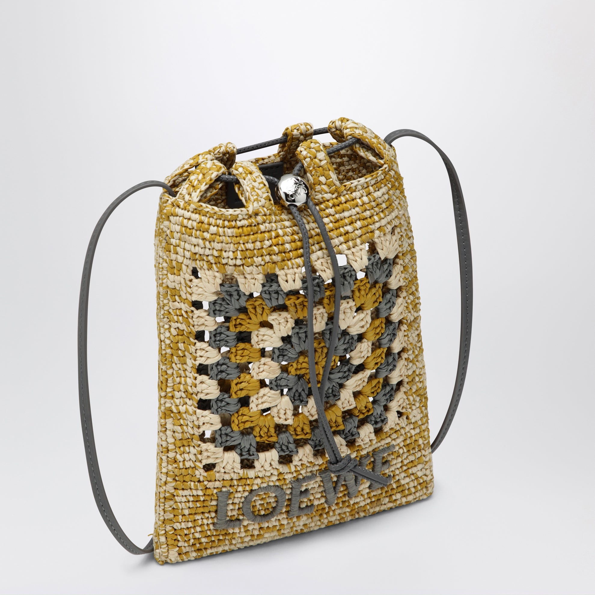 Pearl grey/mustard raffia and leather drawstring pouch