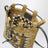 Pearl grey/mustard raffia and leather drawstring pouch
