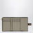 Small vertical taupe calfskin wallet