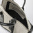 Borsa Sant Ambroeus mini beige e nera effetto coccodrillo