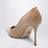 Dark beige patent leather pumps