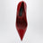 Red patent leather pumps
