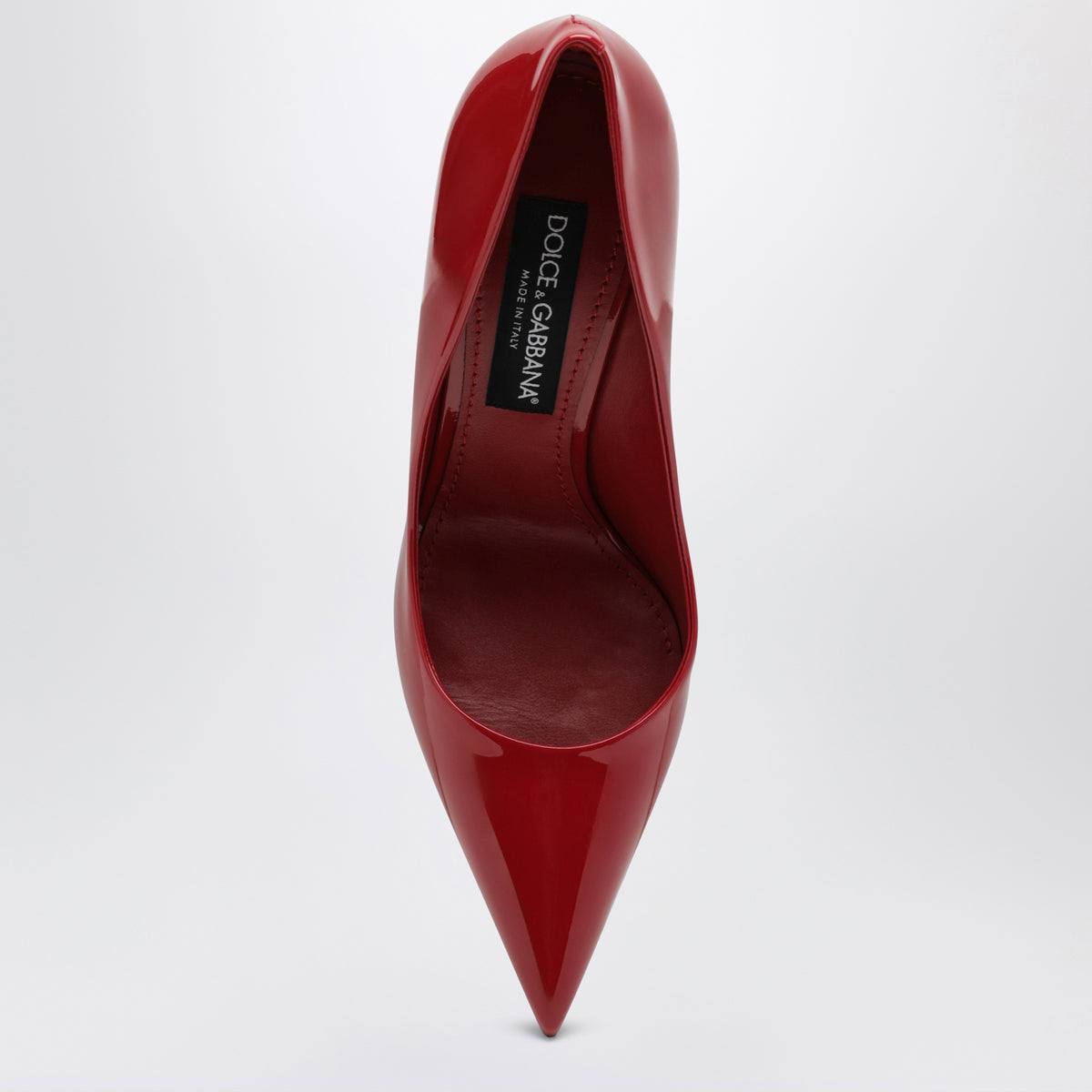 Red patent leather pumps