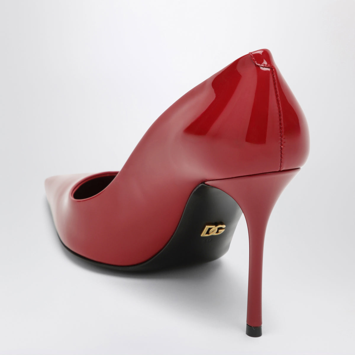 Red patent leather pumps
