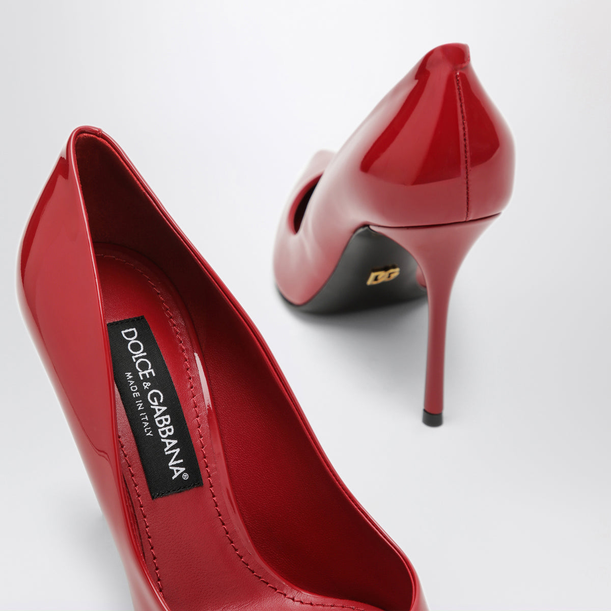 Red patent leather pumps